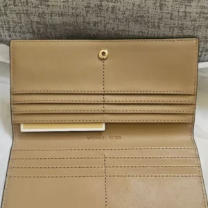 Michael Kors Reed Large Pebbled Leather SnapWallet in the color Camel or Luggage