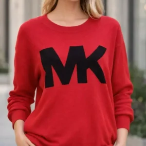 Michael Kors is the brand shown on the sweater.
