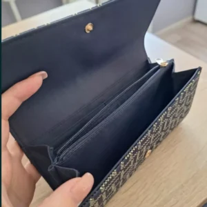 A  sleek envelope _style clutch or long  wallet