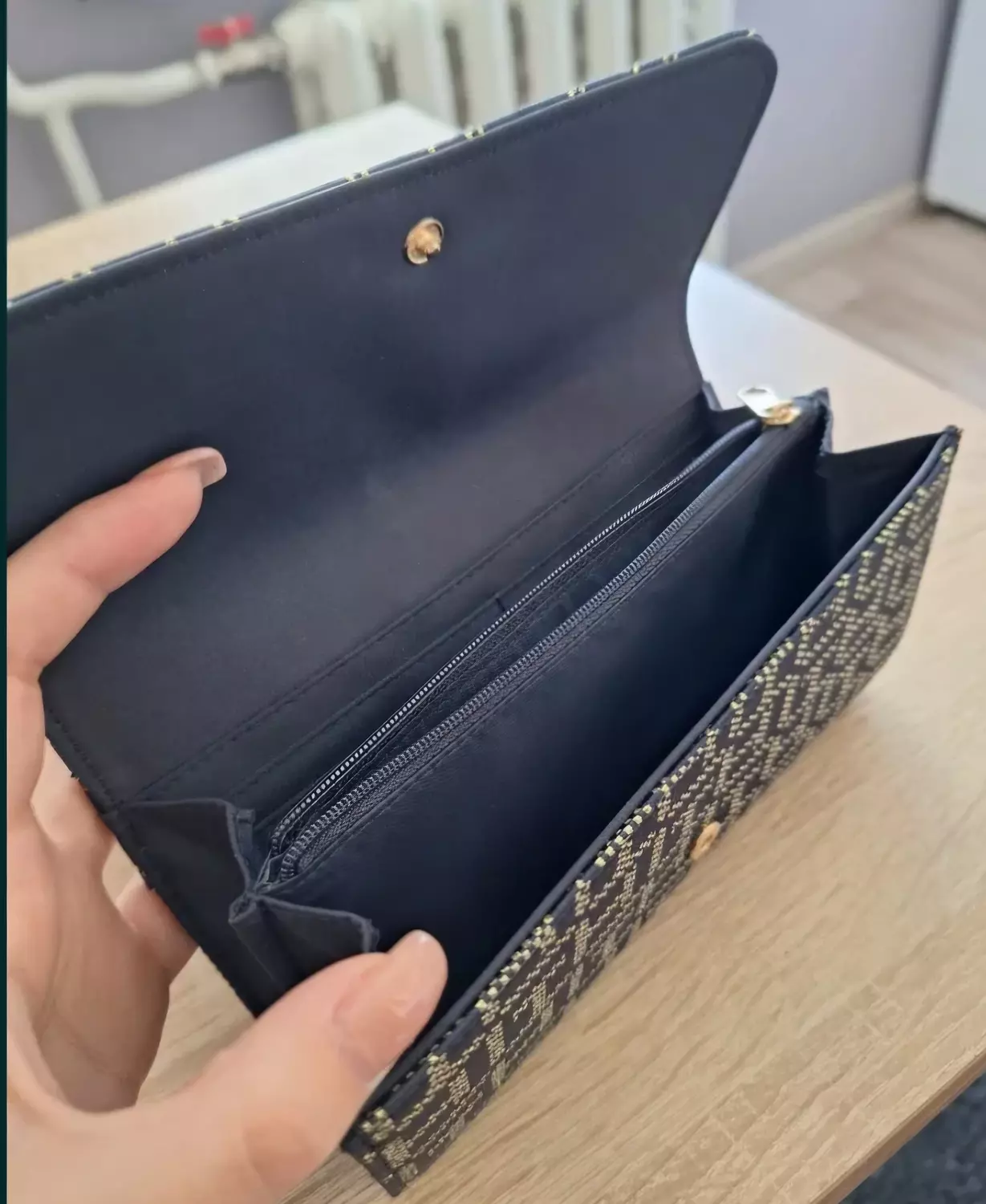 A sleek envelope _style clutch or long wallet
