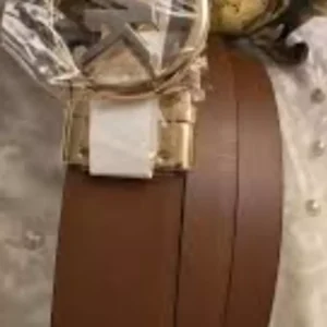 Michael Kors belt is a stylish accessory, often reversible