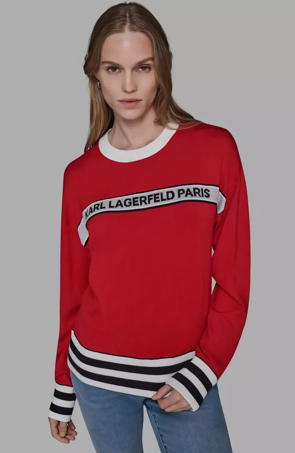 KARL Lagerfeld Paris knit sweater that offers a bold, sporty look