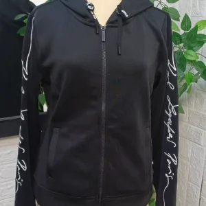 stylish Karl Lagerfeld Paris women’s zip-up hoodie in classic black.