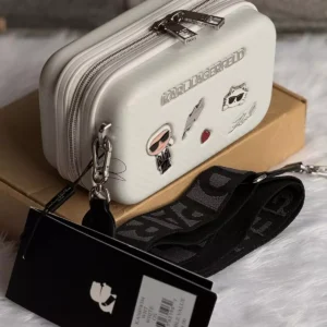 KARL Lagerfeld Paris camera bag with fun ctionality , collevtible aesthetic