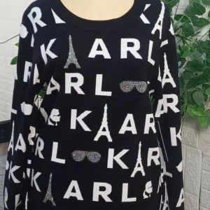 KARL Lagerfeld Paris knit sweater that showcases the brand's iconic motifs a playful
