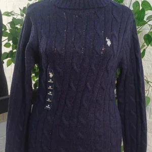 Classic Cable-Knit Turtleneck Sweater.