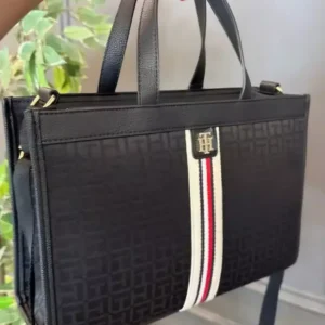 Tommy Hilfiger the bag features an all-over TH monogram print on a dark fabric