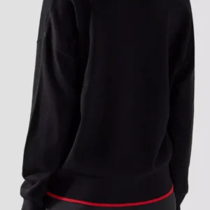 KARL Lagerfeld Paris knit sweater that offers a sophisticated and sporty aesthetic