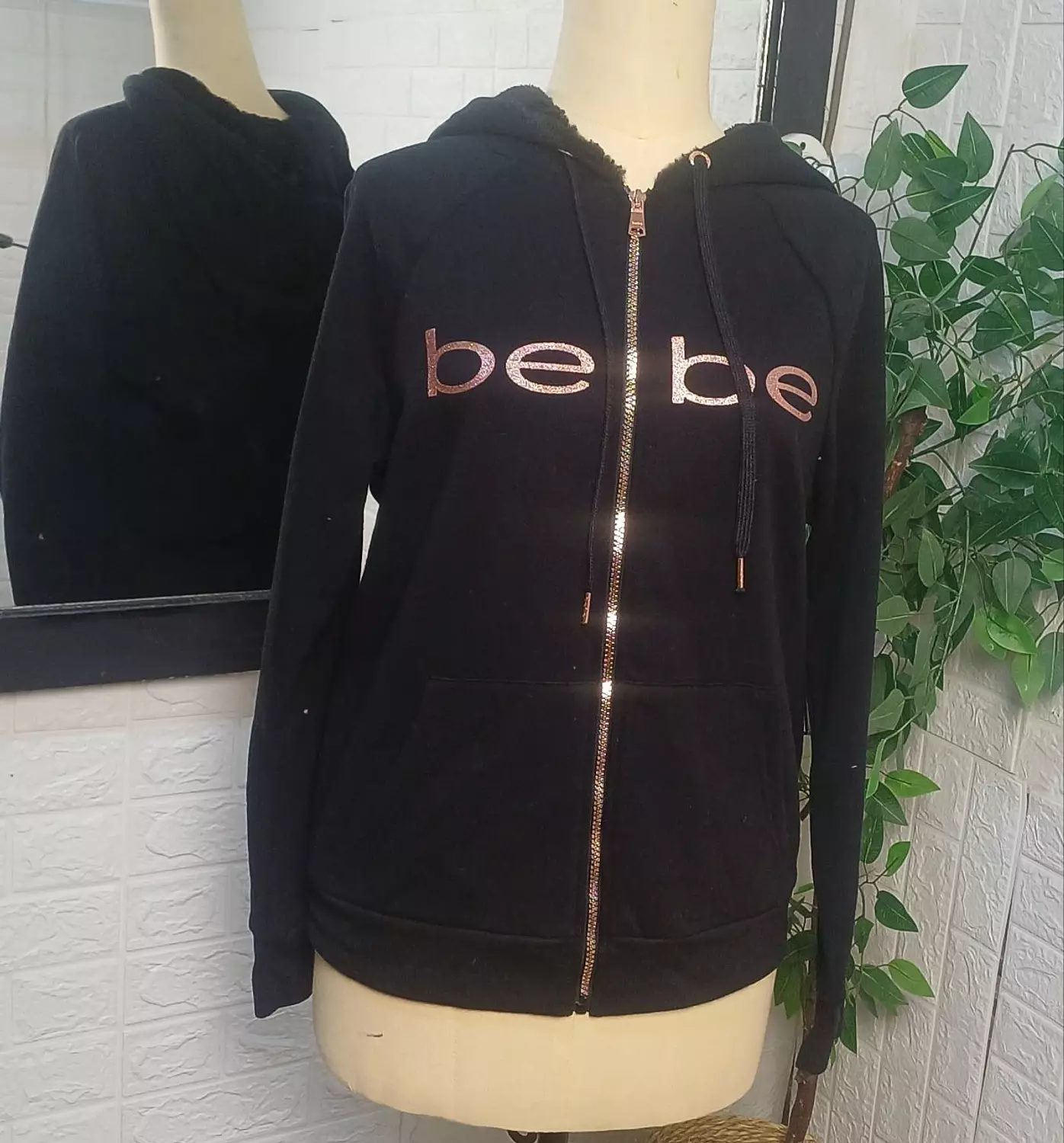 Bebe zip-up hoodie featuring a rose gold glitter logo for a stylish athletic look." - Image 2